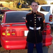Phil Vaughn in his Marine Corps dress uniform in 2005, following his return from Iraq